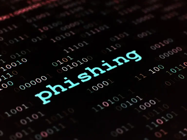 The word "phishing" glows in blue against a dark background filled with binary code.