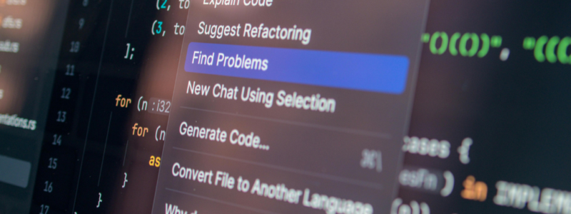 A computer screen showing code editor with an AI actions menu, highlighting the "Find Problems" option, against blurred programming code in the background.